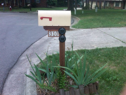 Mounted address box as seen driving up the street.