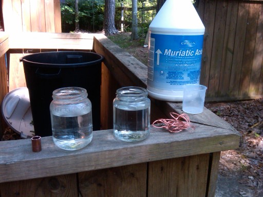 HCL+H2O2 solutions, copper pipe, copper wire, and the jug of HCl in the background.